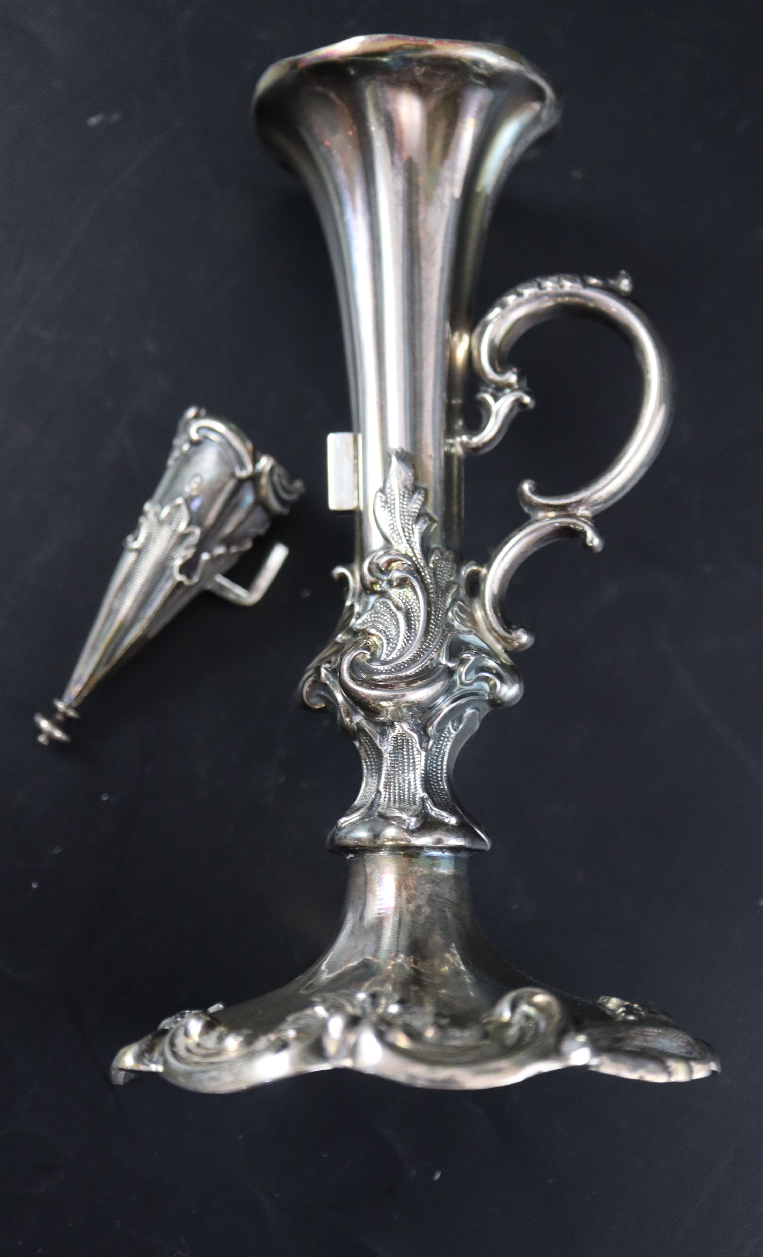 An ornate Victorian silver chamberstick, 14.3cm, gross 194 grams.